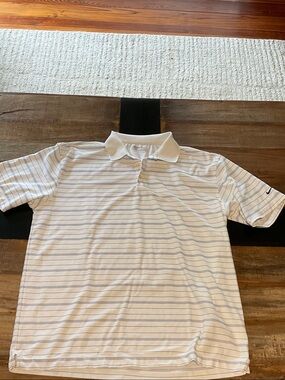 Nike men’s White golf Polo with Light Blue Stripe Detailing. Golf  Nike FitDry